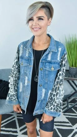 BiBi OUTERWEAR Distressed Denim Jacket With Leopard Sleeves