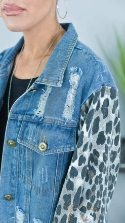 BiBi OUTERWEAR Distressed Denim Jacket With Leopard Sleeves