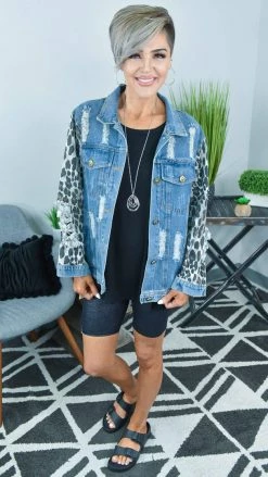BiBi OUTERWEAR Distressed Denim Jacket With Leopard Sleeves
